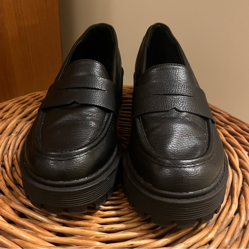 Black platform loafers